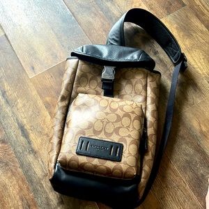 Coach West Pack in brown and black.